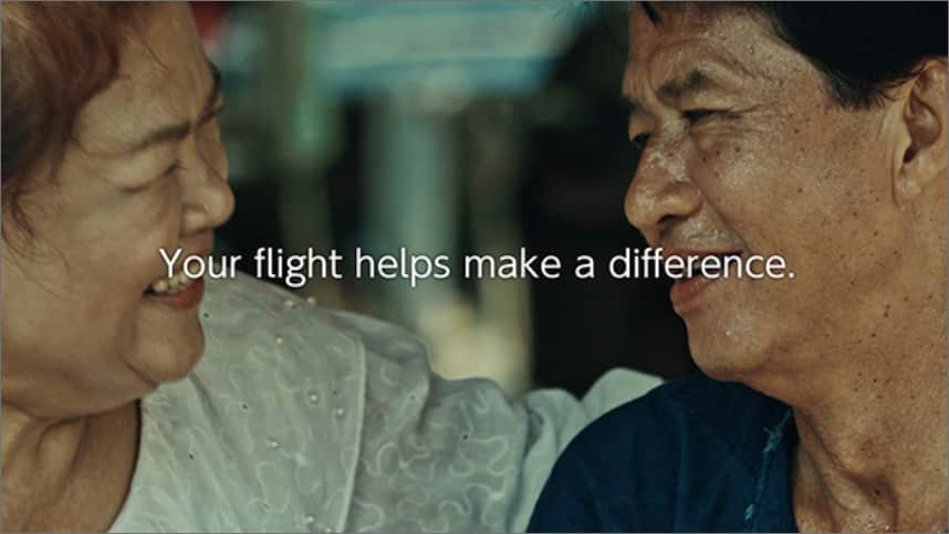 a couple smiling at each other